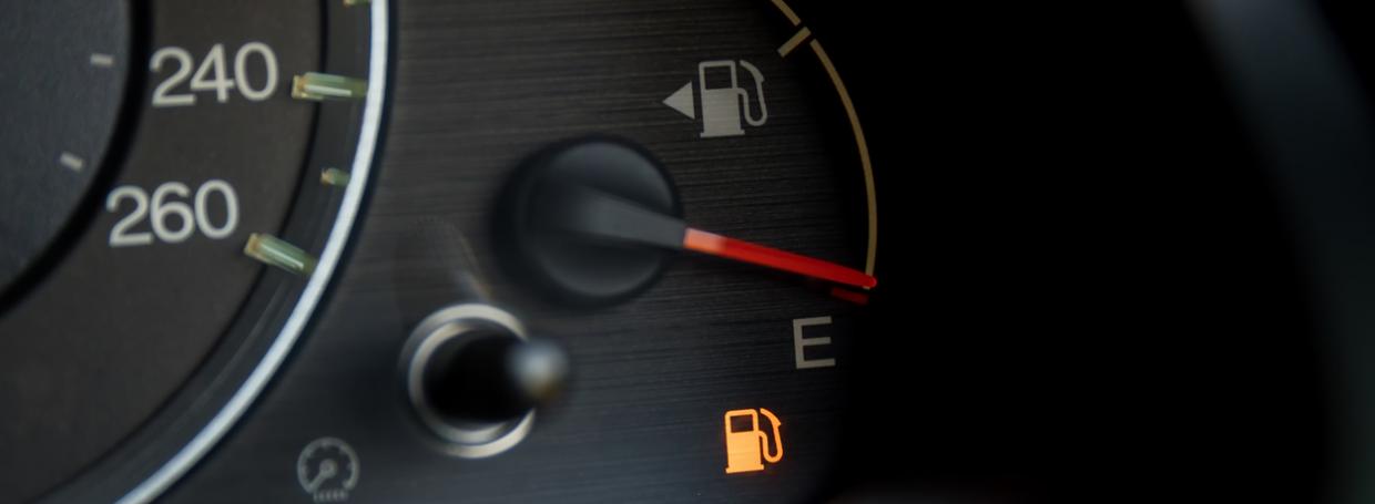 DirectAsia Insurance_Car petrol fuel icon lit up in orange, signaling empty fuel
